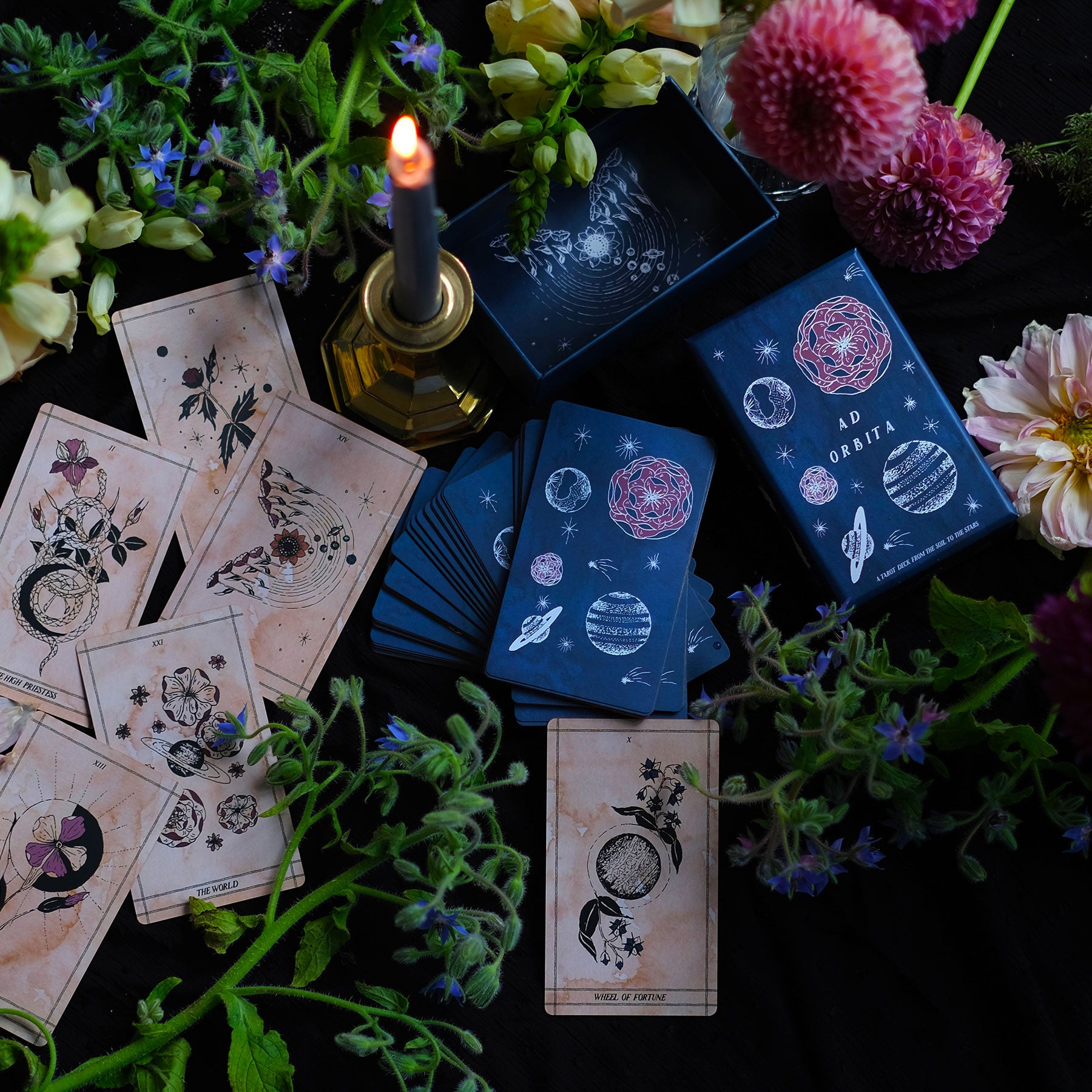 From the soil to the stars, the Ad Orbita Tarot explores ancient orbits of inner and outer space. Through 78 cards — Major and Minor Arcana — Ad Orbita journeys past the present's night sky, into the sprawling, boundless realm of imagination. 